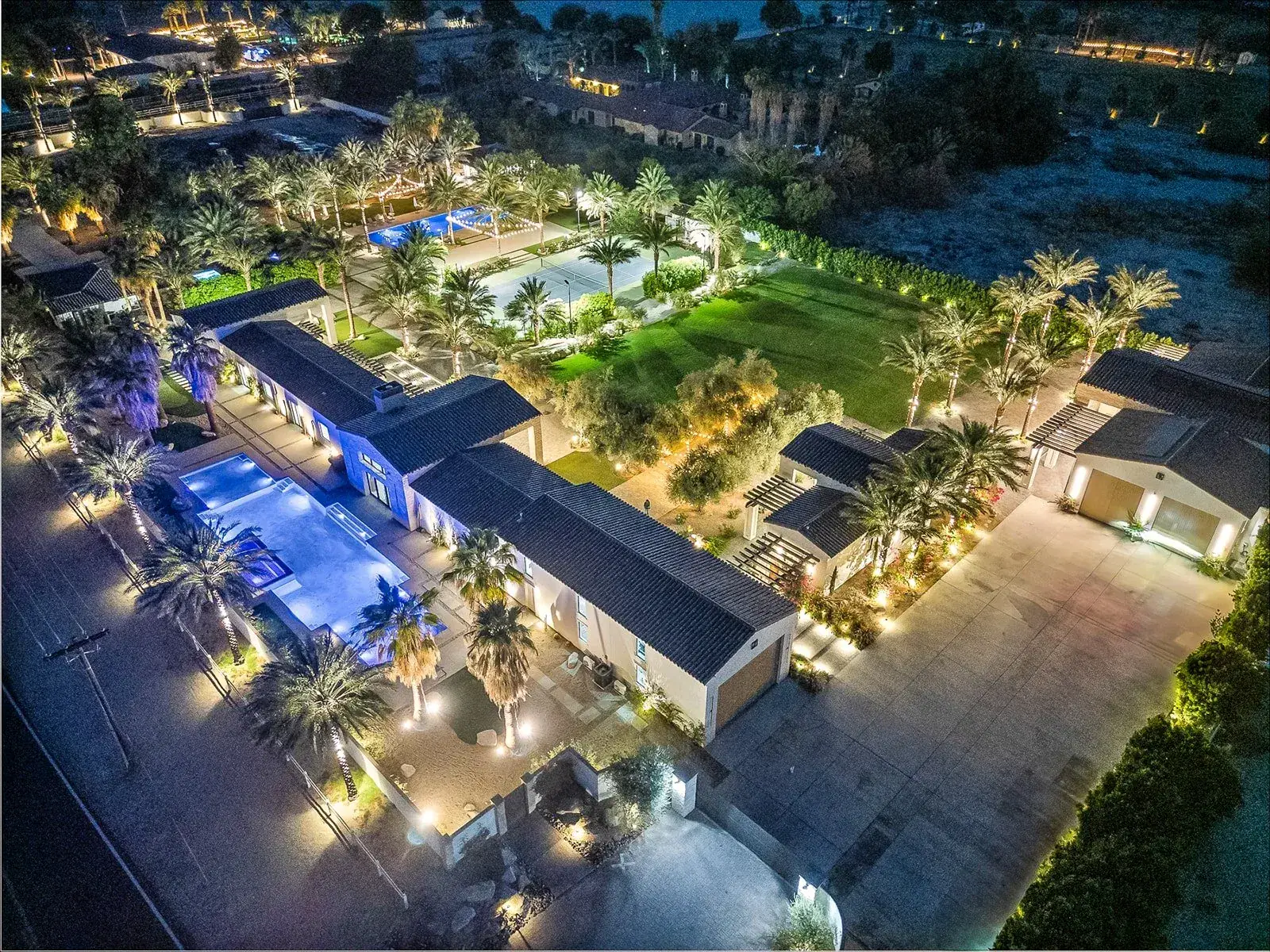 The estate at night, wide
