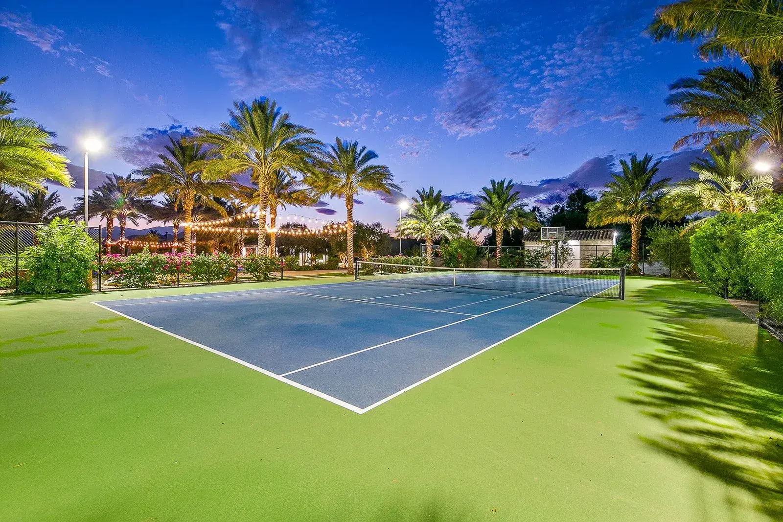 The floodlit tennis court